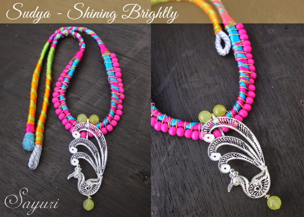 multicolor silk necklace with silver pendant