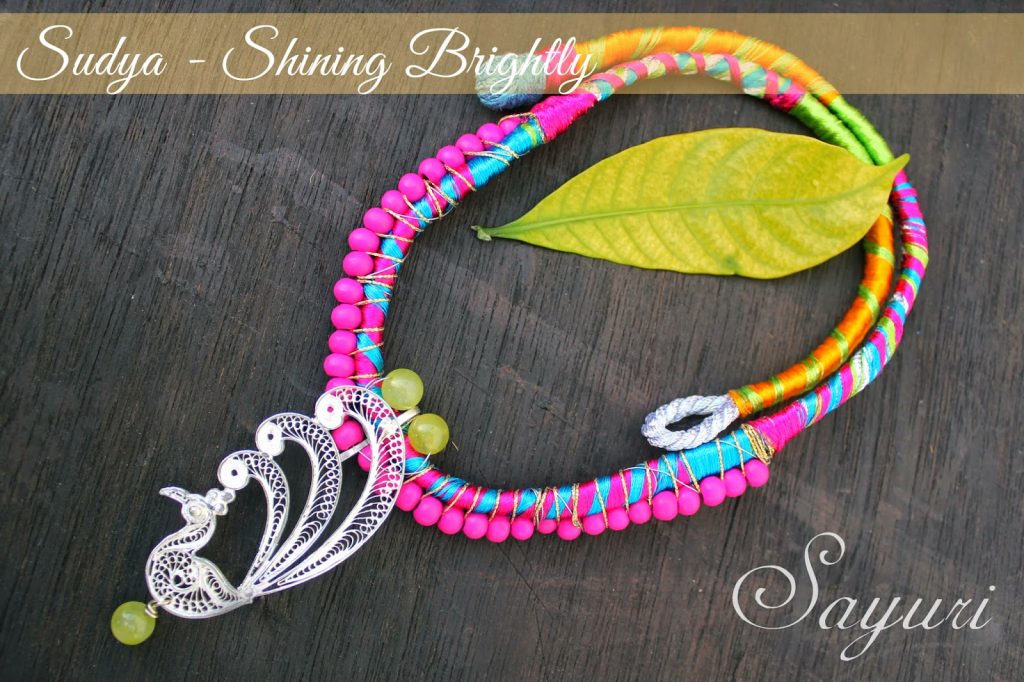 multicolor silk necklace with silver pendant
