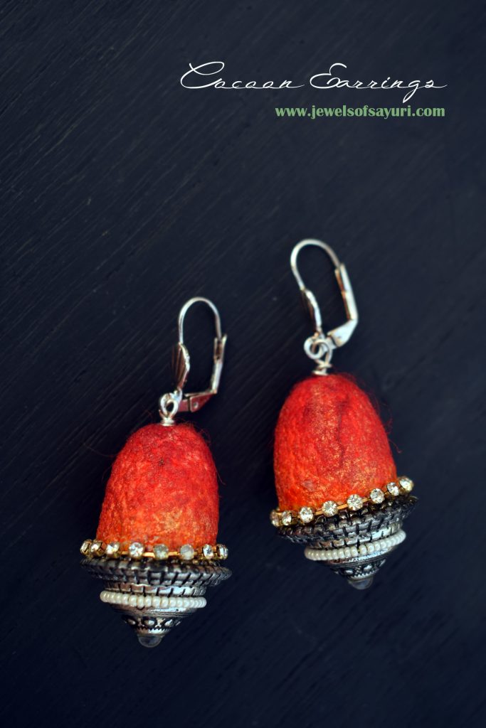 red coccon earring