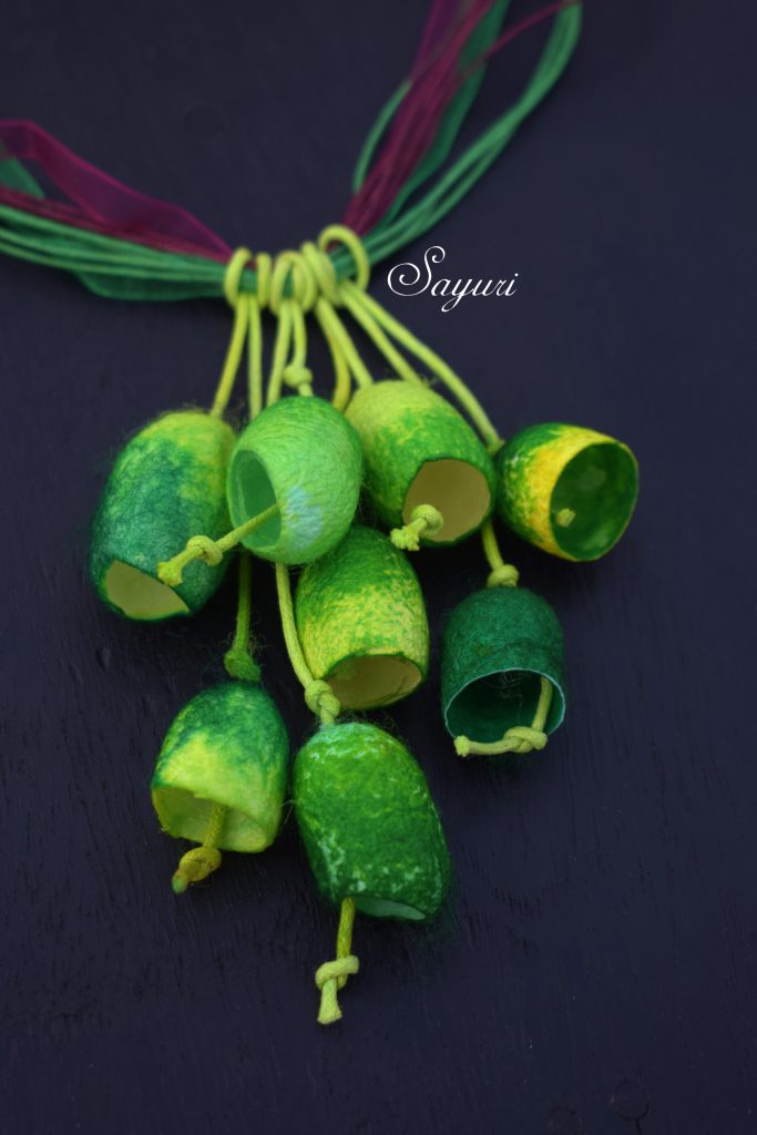 green cocoon necklace