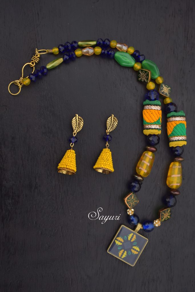 green and yellow rangoli necklace by Divya N