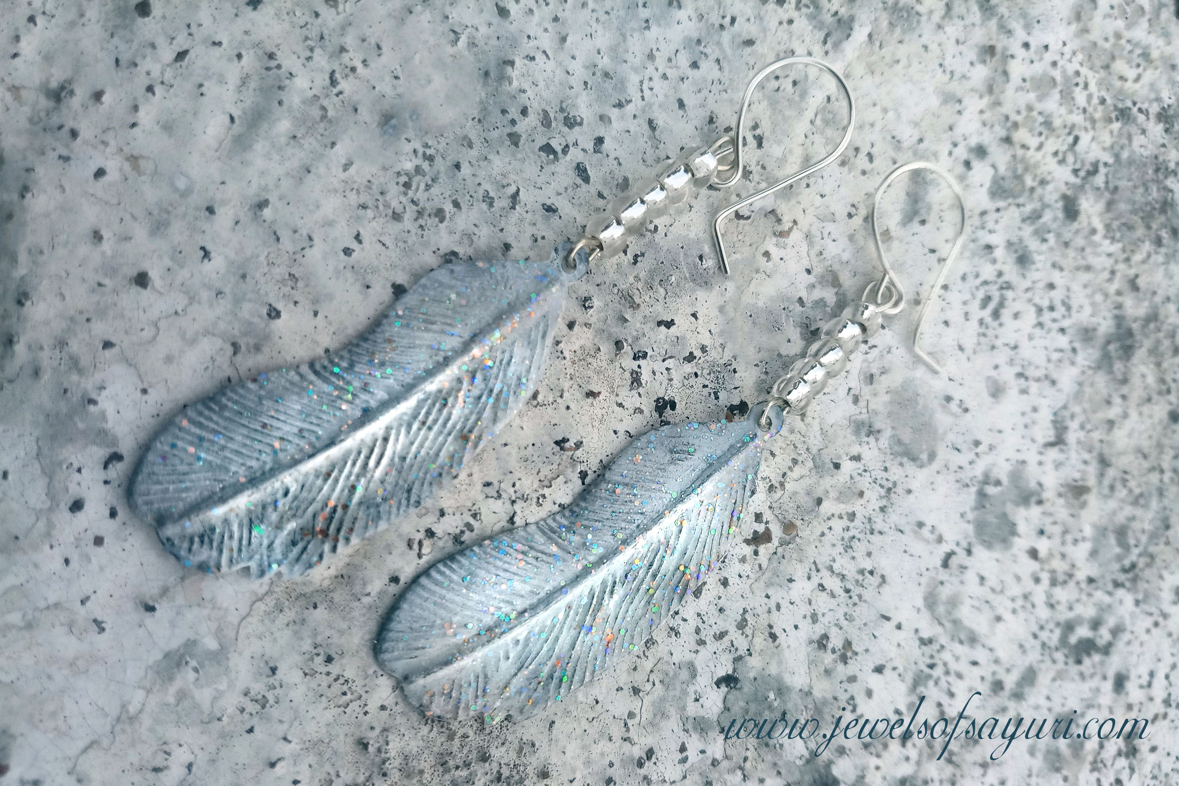 Frosty feather earrings