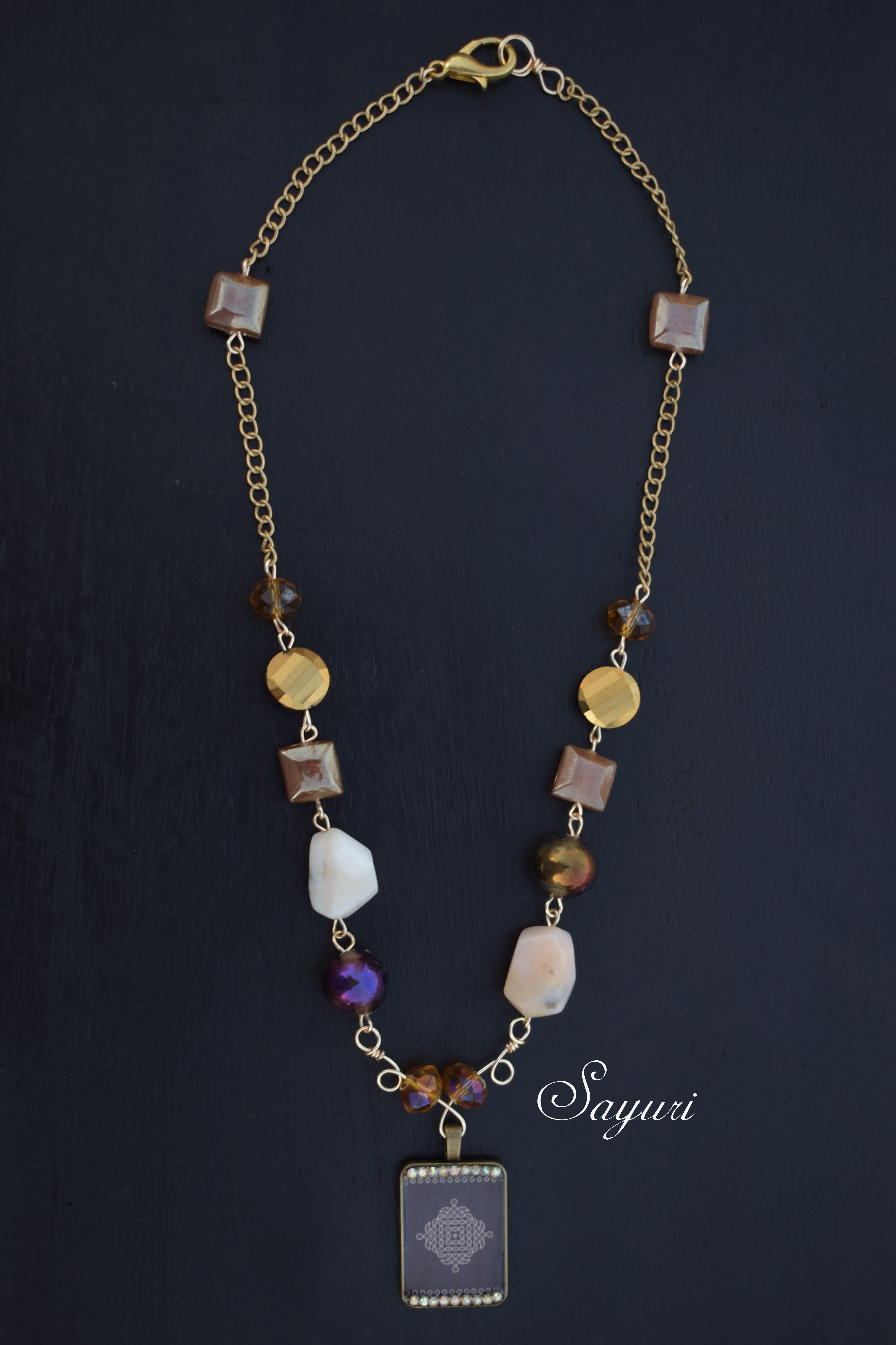 Monochromatic Pulli Kolam jewellery