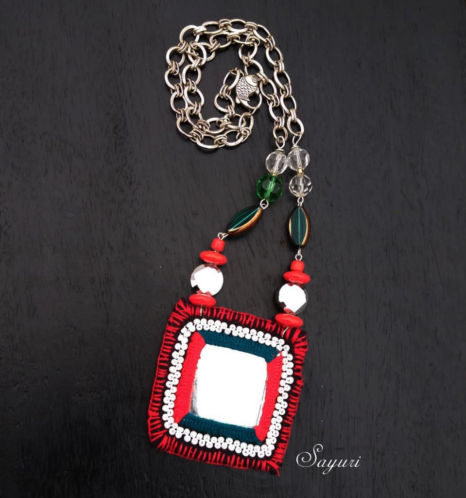 red green mirror necklace