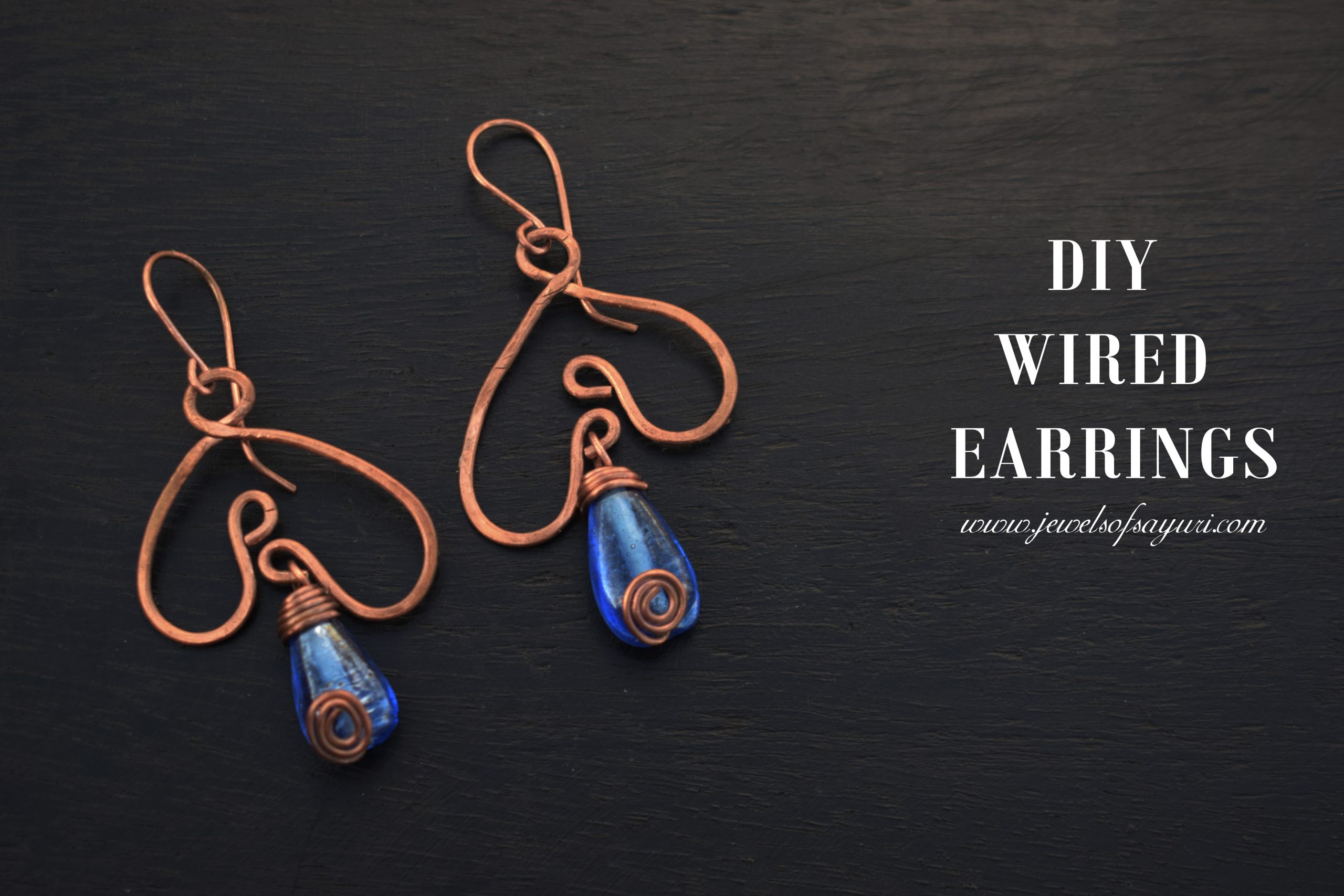 wire copper earrings in blue