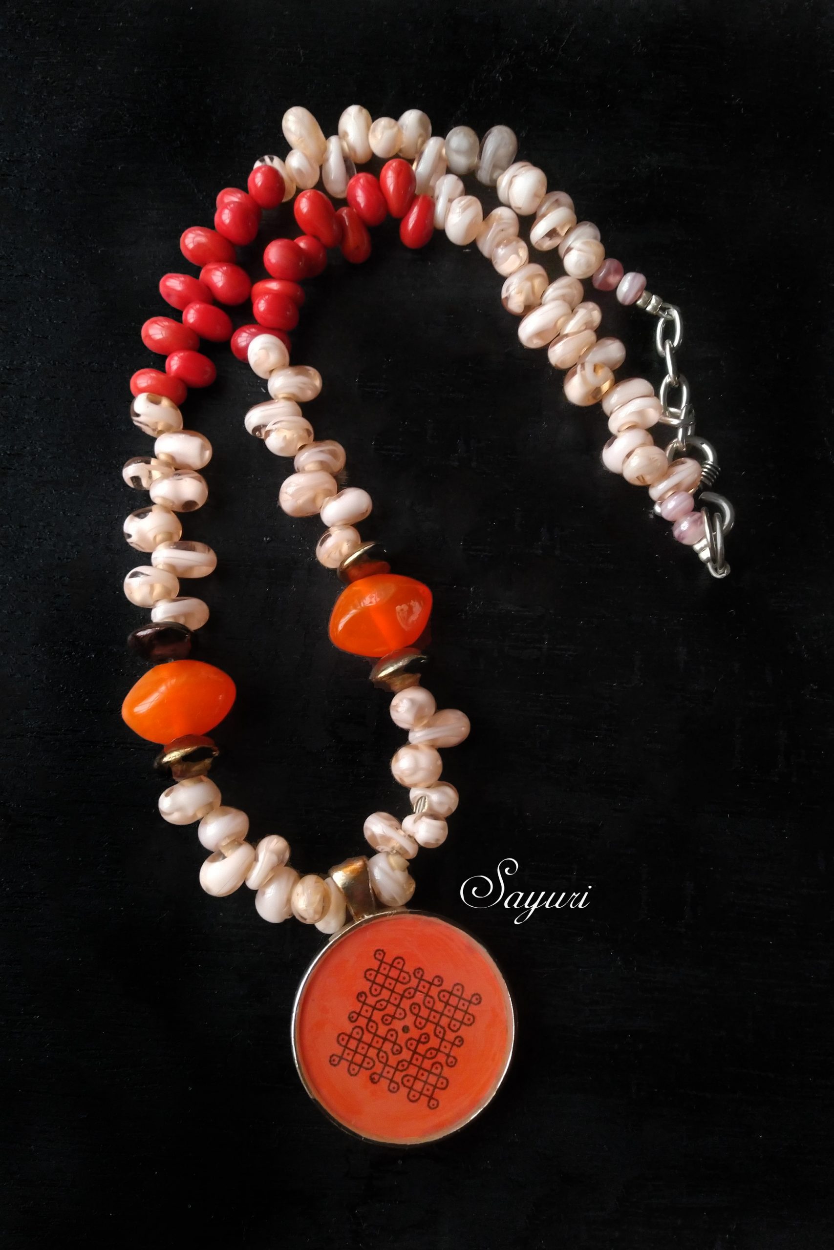Orange mandala jewellery