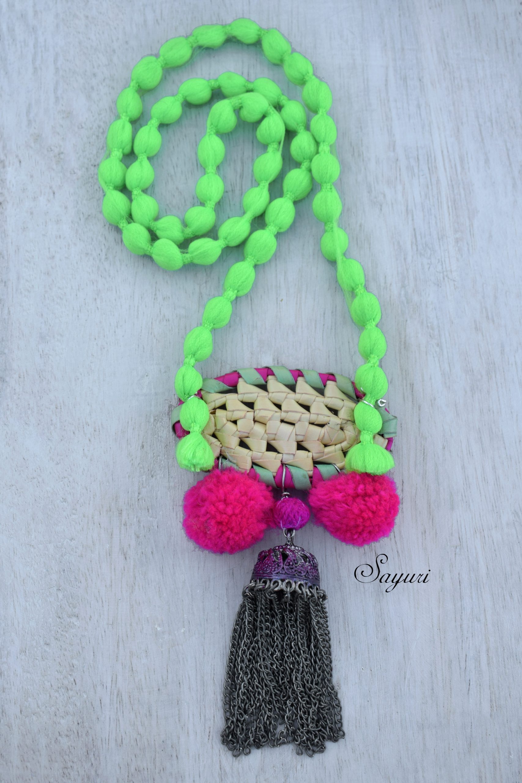 palm leaf and pom pom necklace