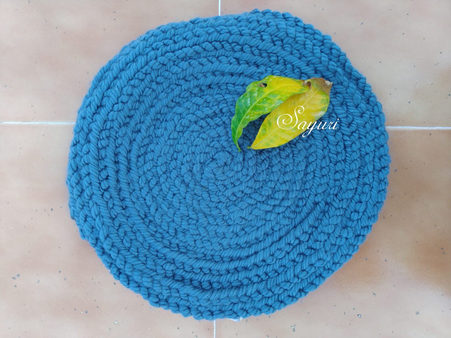 blue crochet mat
