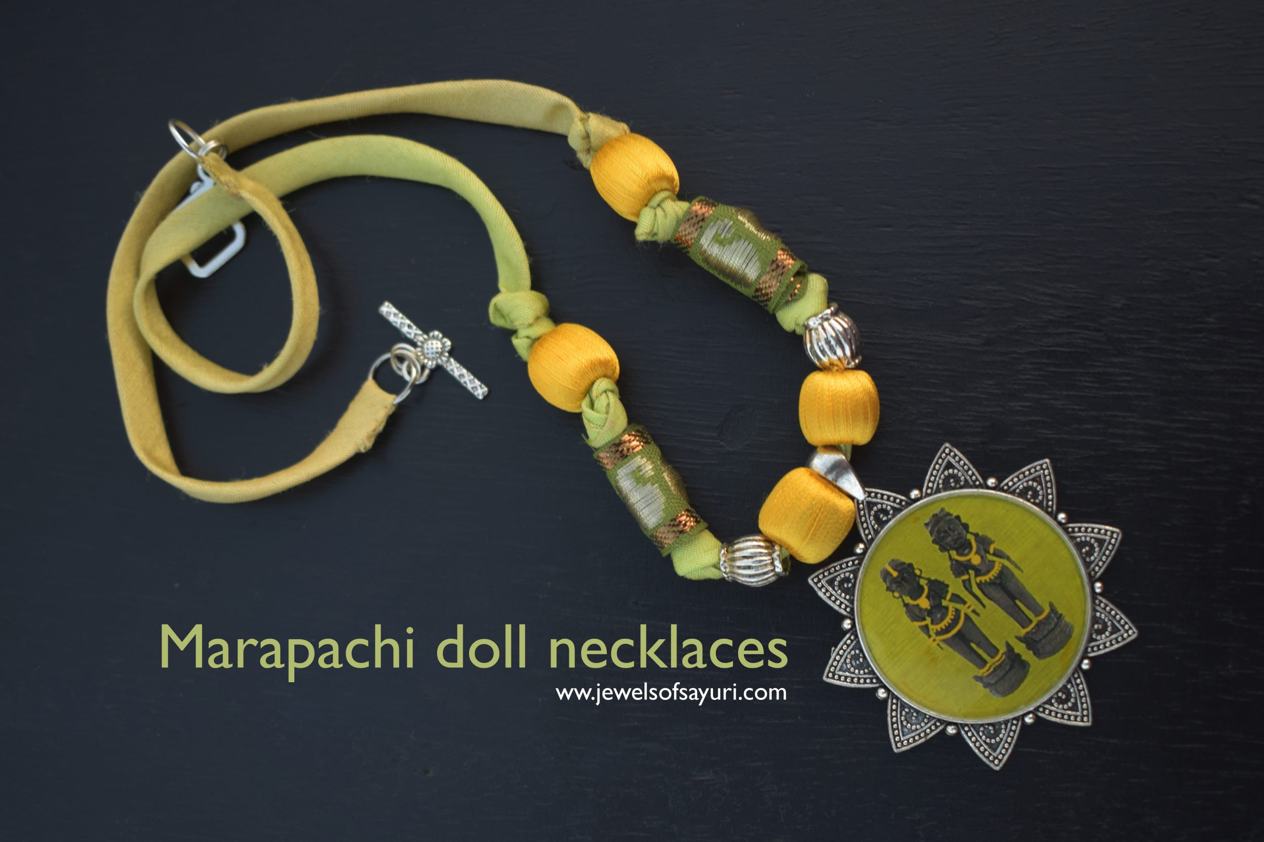 Marapachi doll necklaces