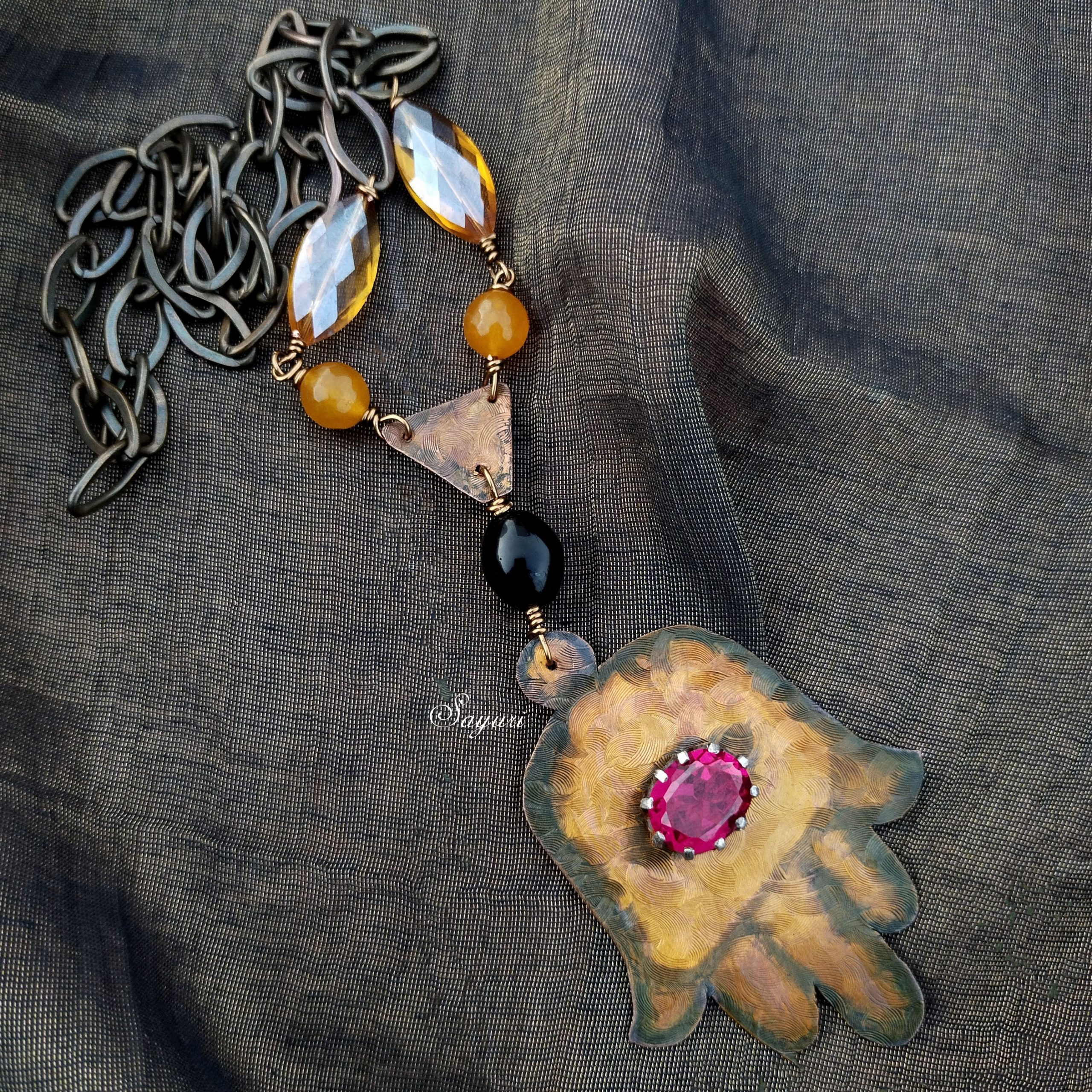 Hamsa hand necklace in copper