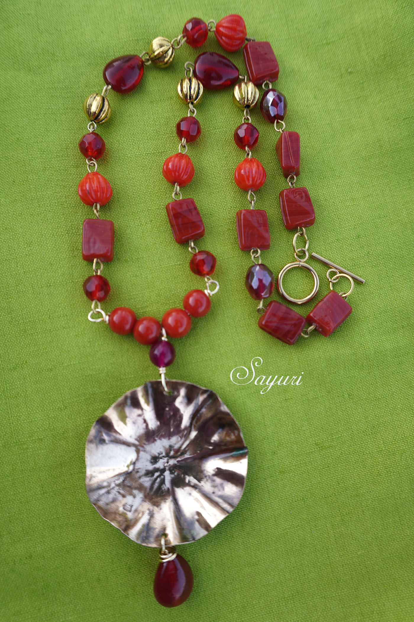 copper flower necklace with red beads