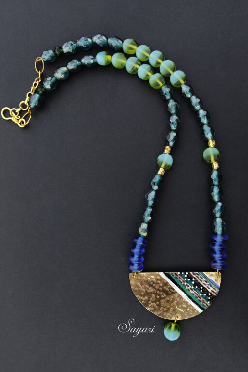 brass pendant necklace with glass beads