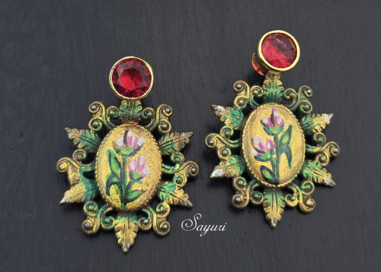 ornate gold resin earrings